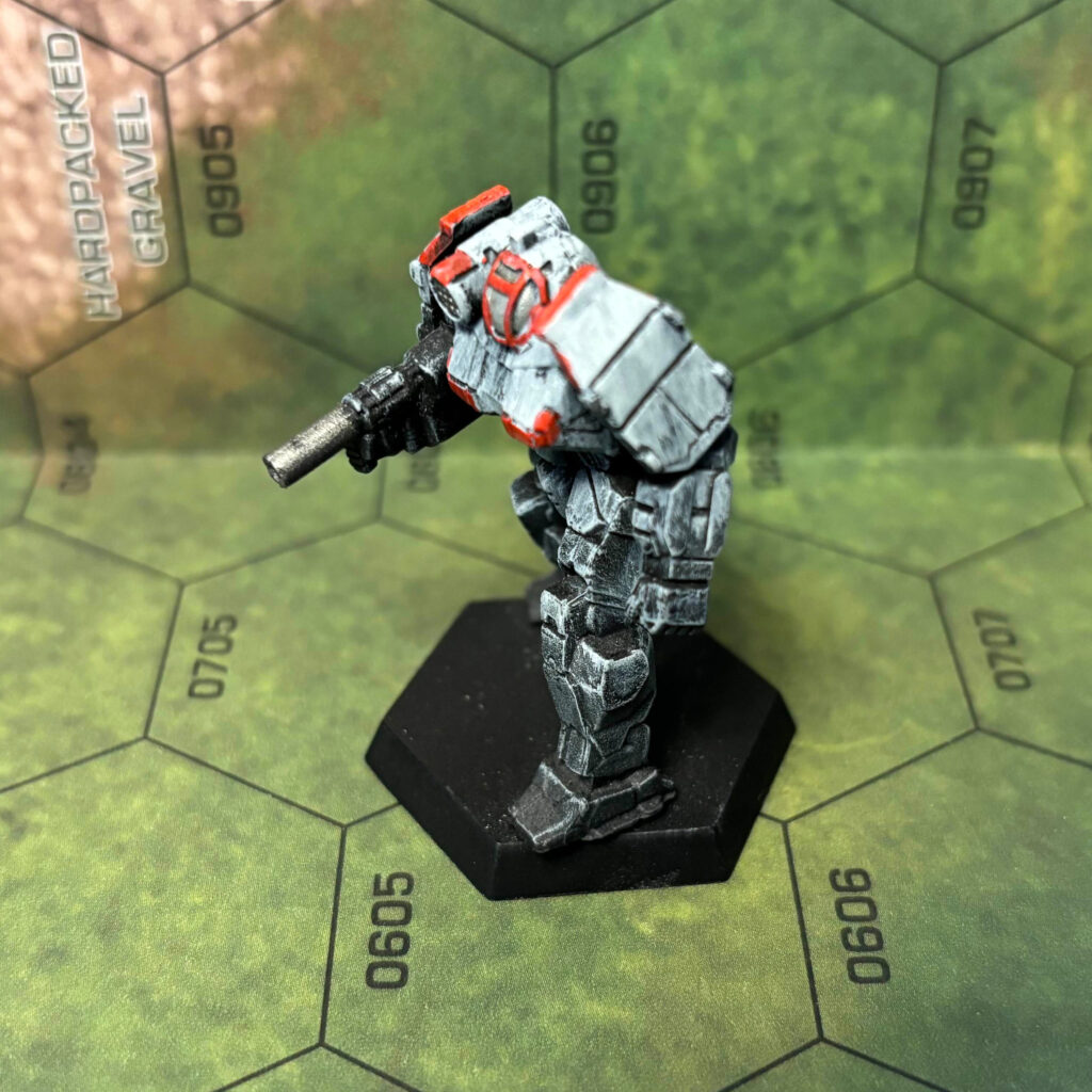 Griffin miniature painted into a white-to-black fade with red accents