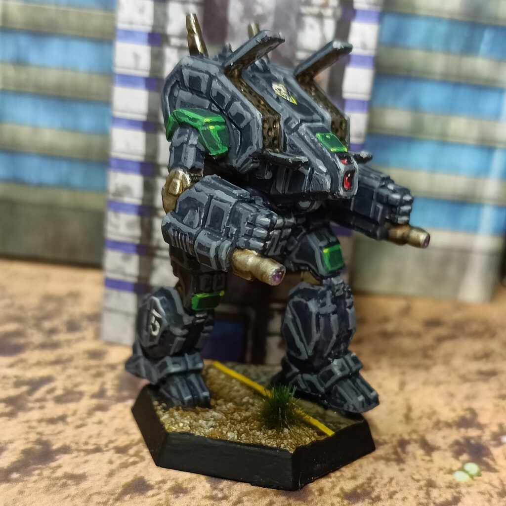 an Archer miniature painted in black with green accents