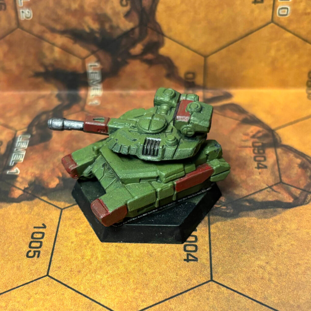 Manticore tank painted in olive drab with red highlights
