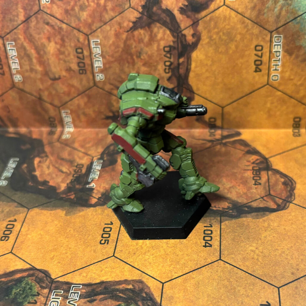 Nightsky miniature painted olive green with dark red highlights