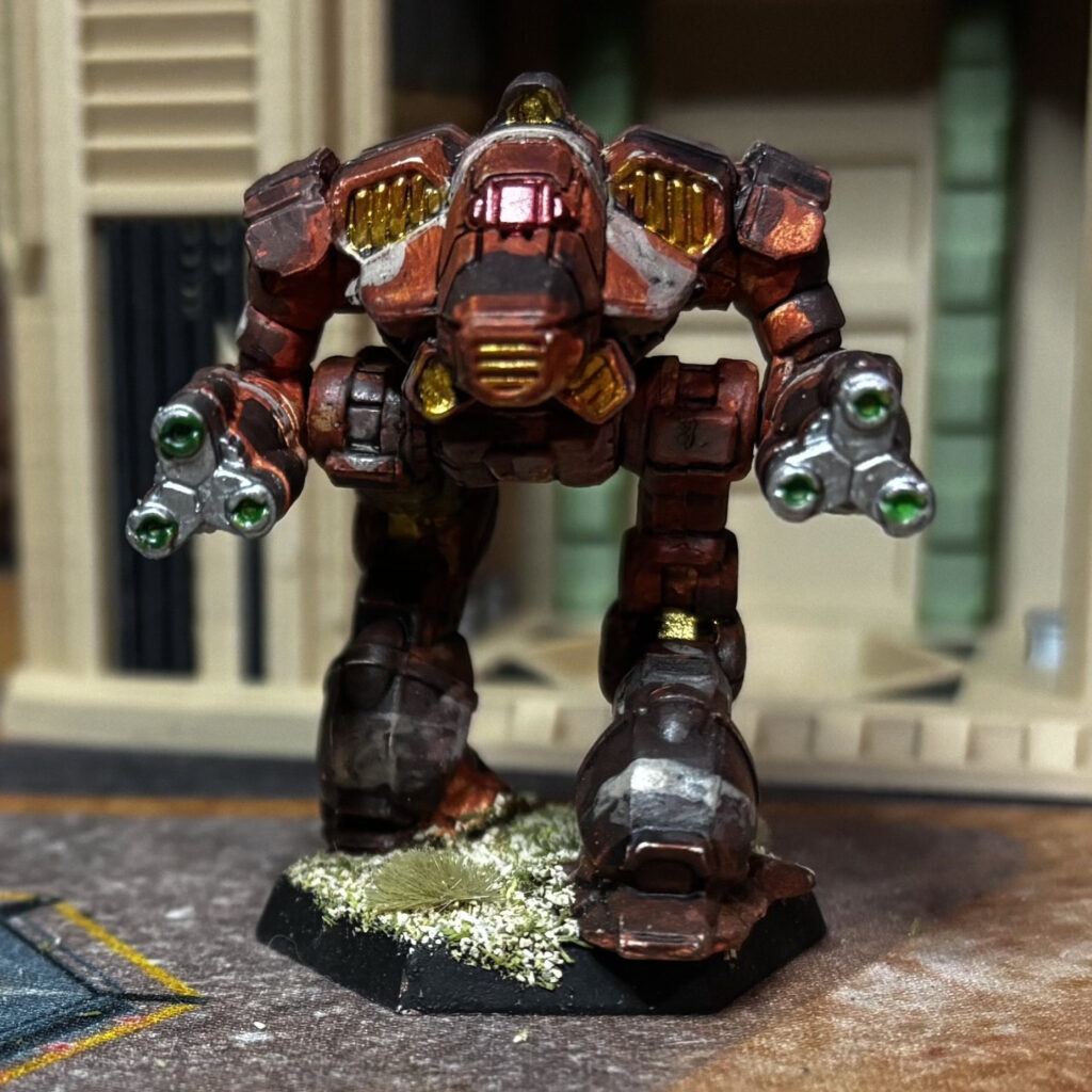 Supernova miniature in red-brown, black, and grey camouflage