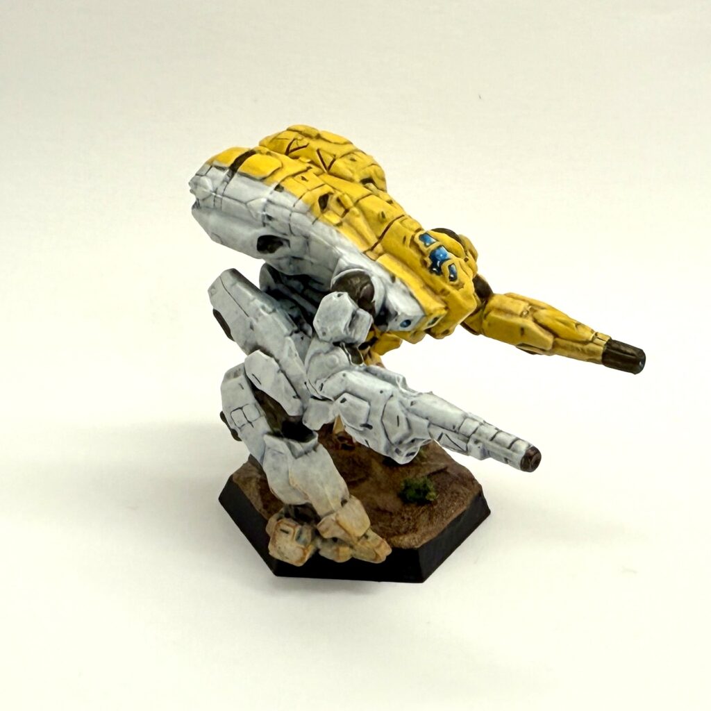 a Falconer miniature painted in yellow and white