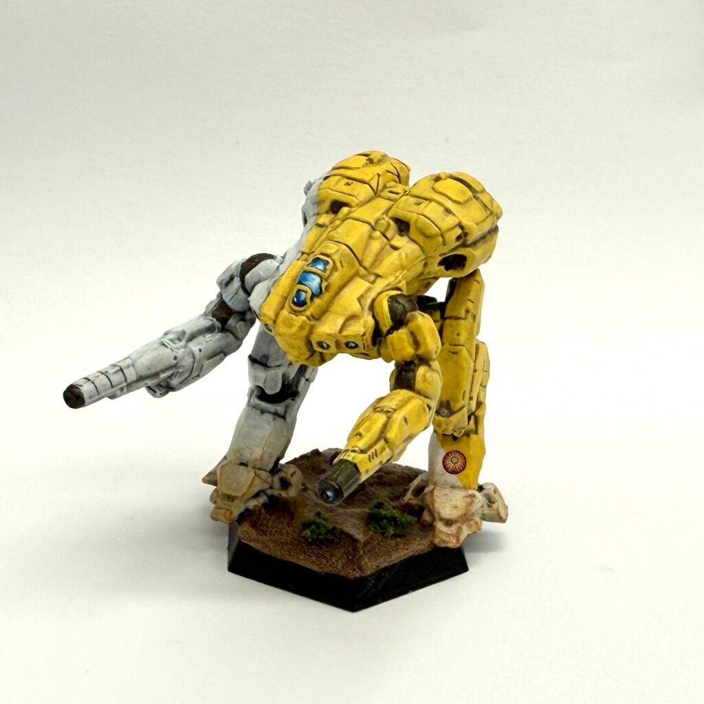 a Falconer miniature painted in yellow and white