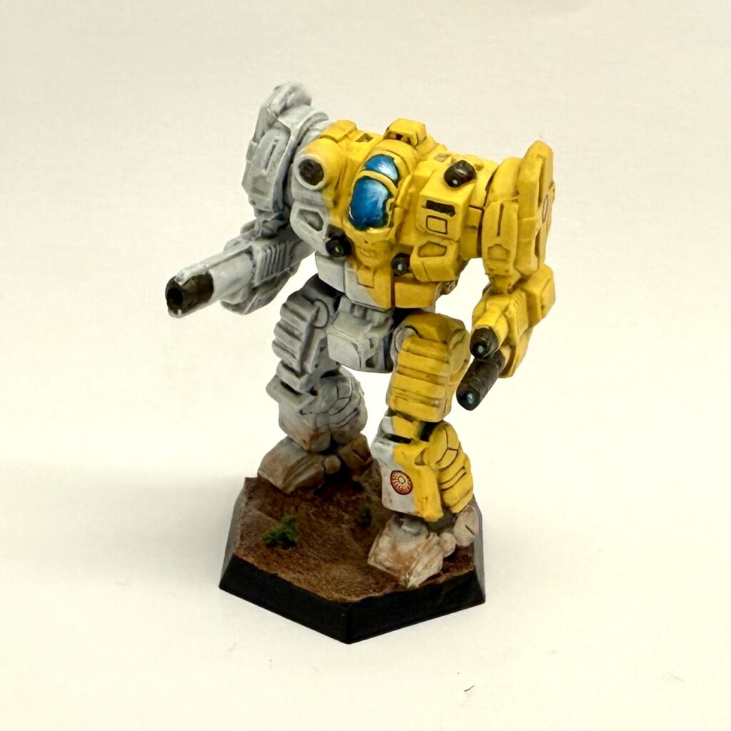 a Templar miniature painted in yellow and white