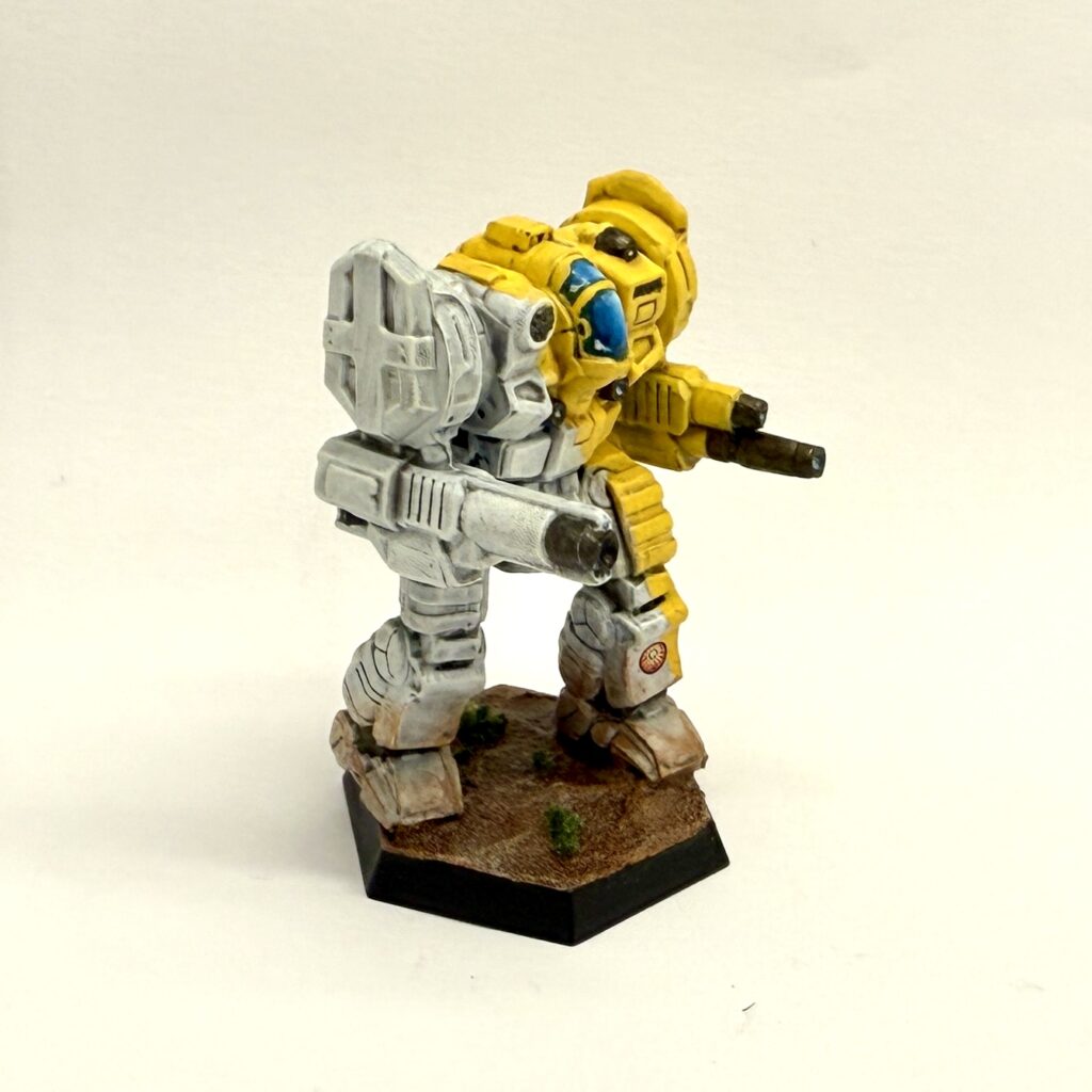 a Templar miniature painted in yellow and white