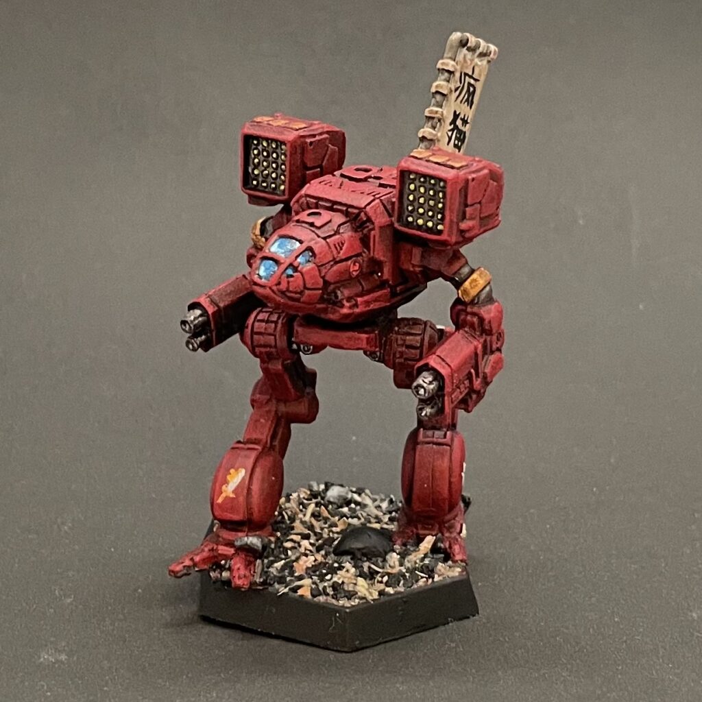 a Timber Wolf miniature painted in red with gold accents and a kitbashed banner