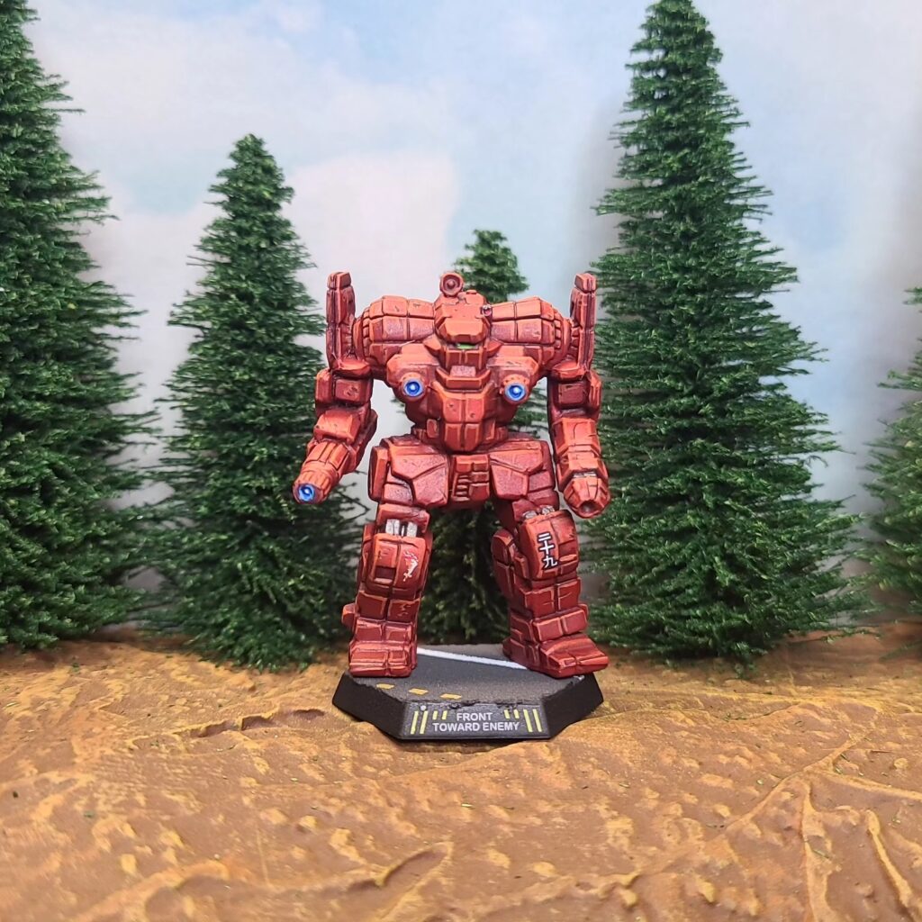 an Awesome miniature painted red with a green cockpit