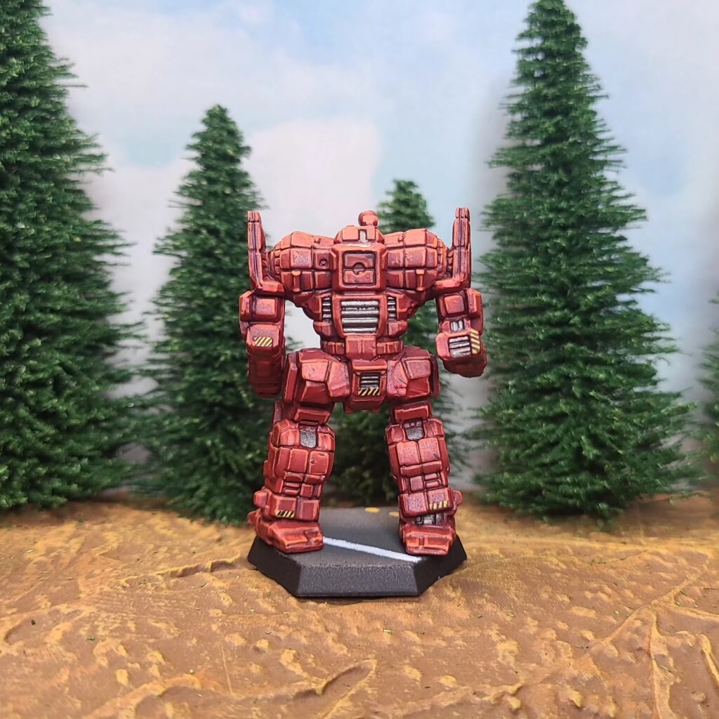 an Awesome miniature painted red with a green cockpit