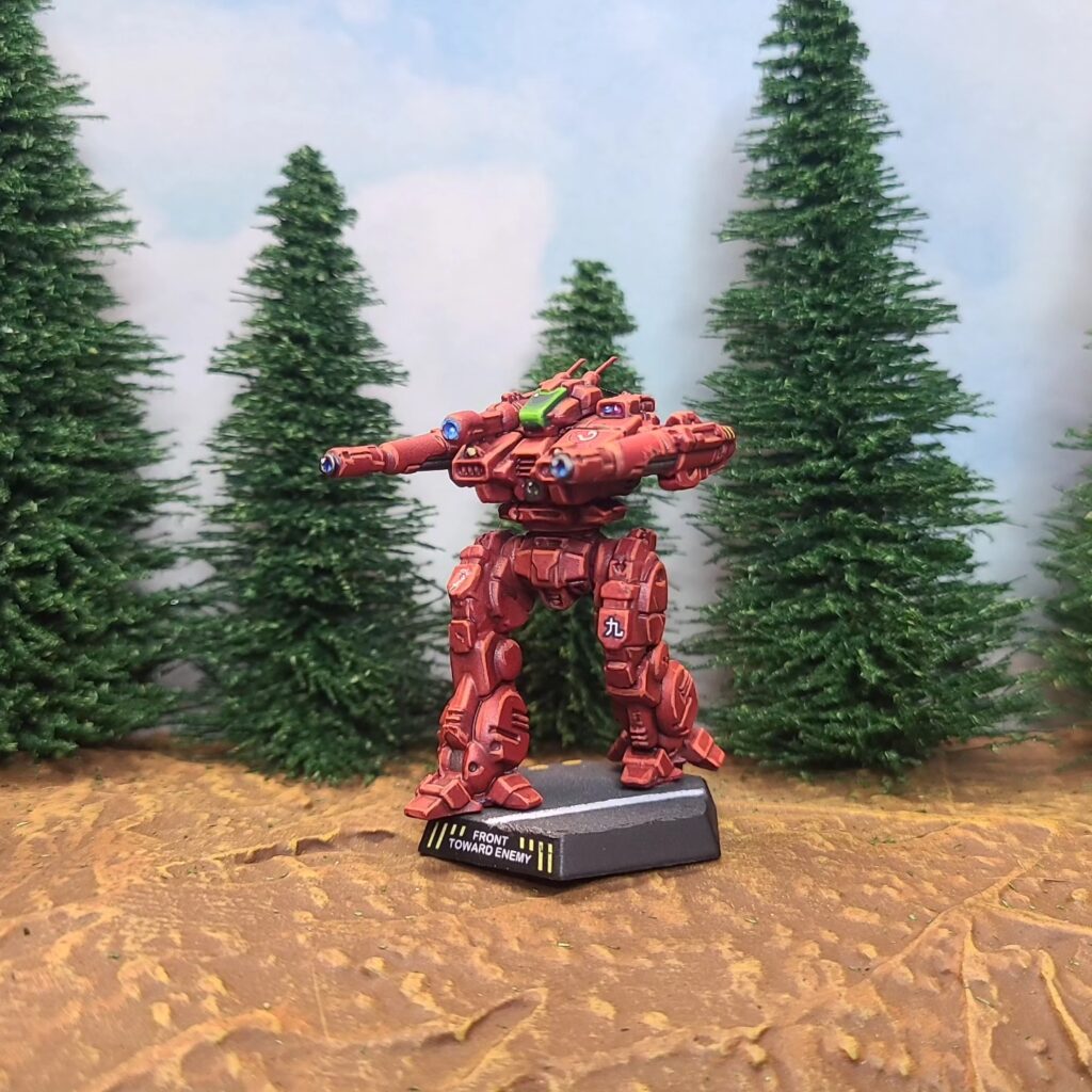 a Lancelot miniature painted red with a green cockpit