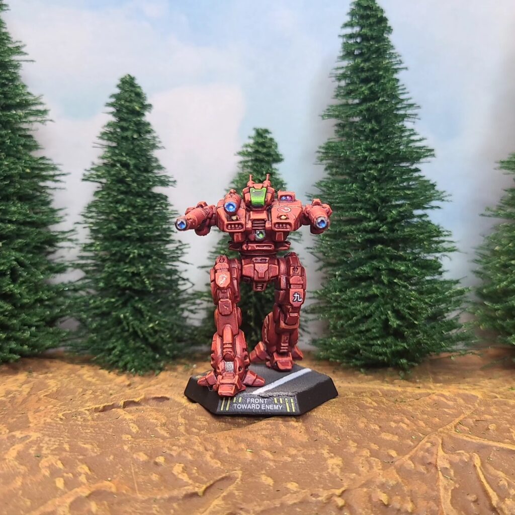 a Lancelot miniature painted red with a green cockpit