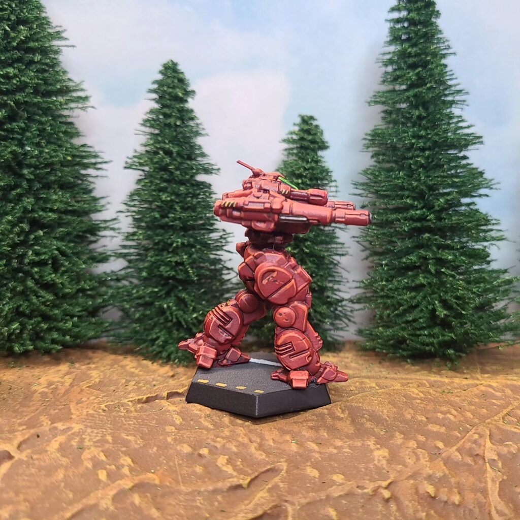 a Lancelot miniature painted red with a green cockpit