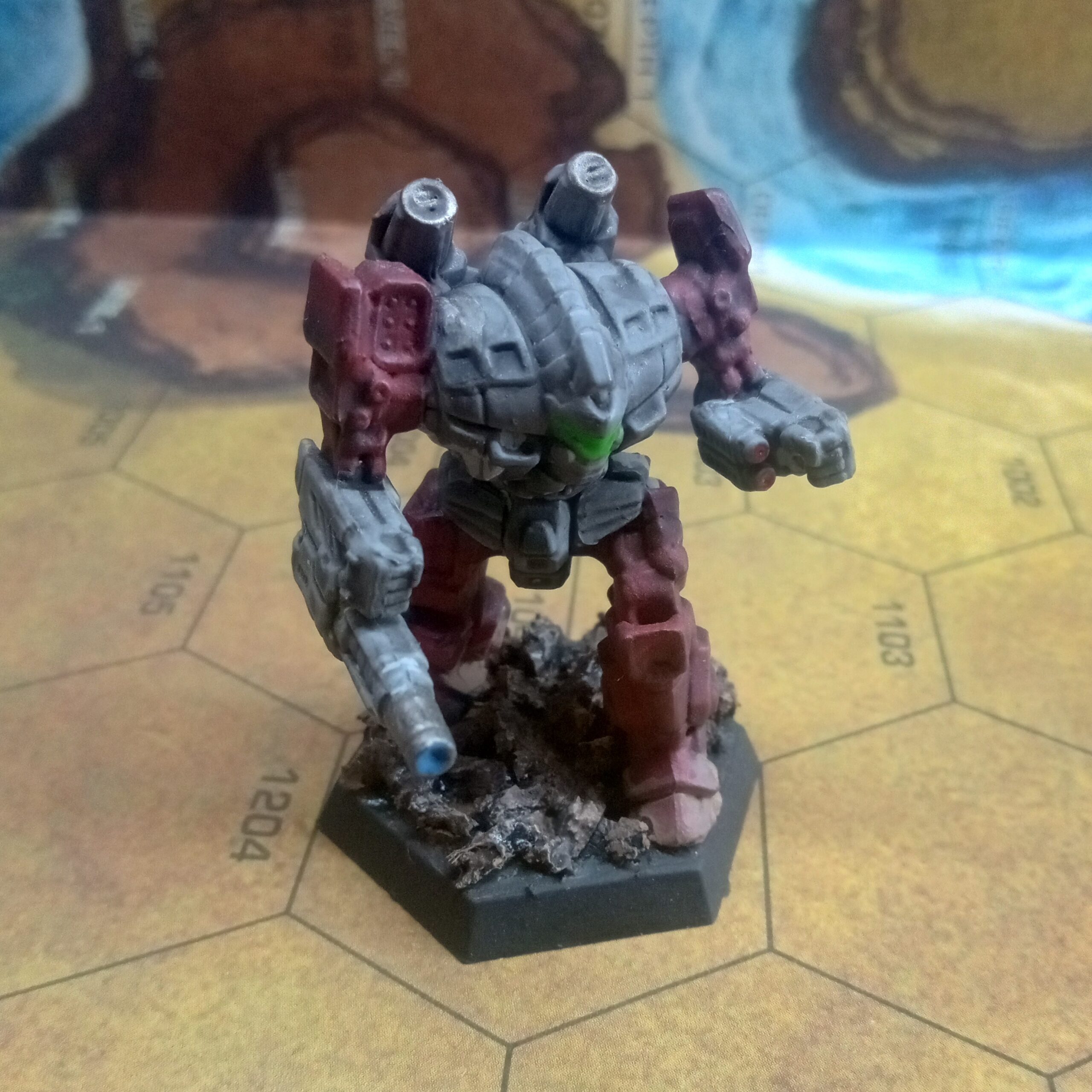 Gladiator miniature painted grey and red