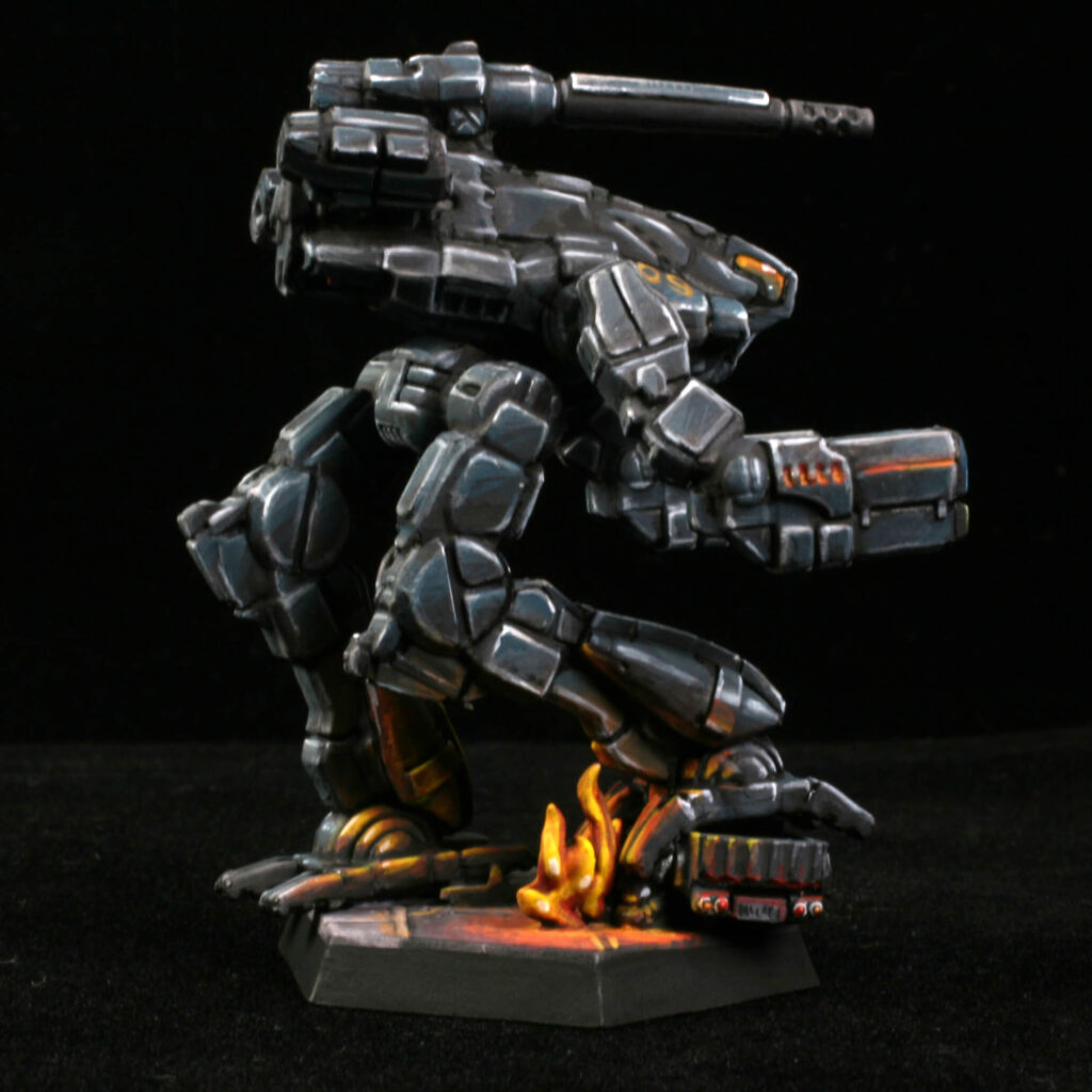a Marauder miniature painted black with kitbashed terrain
