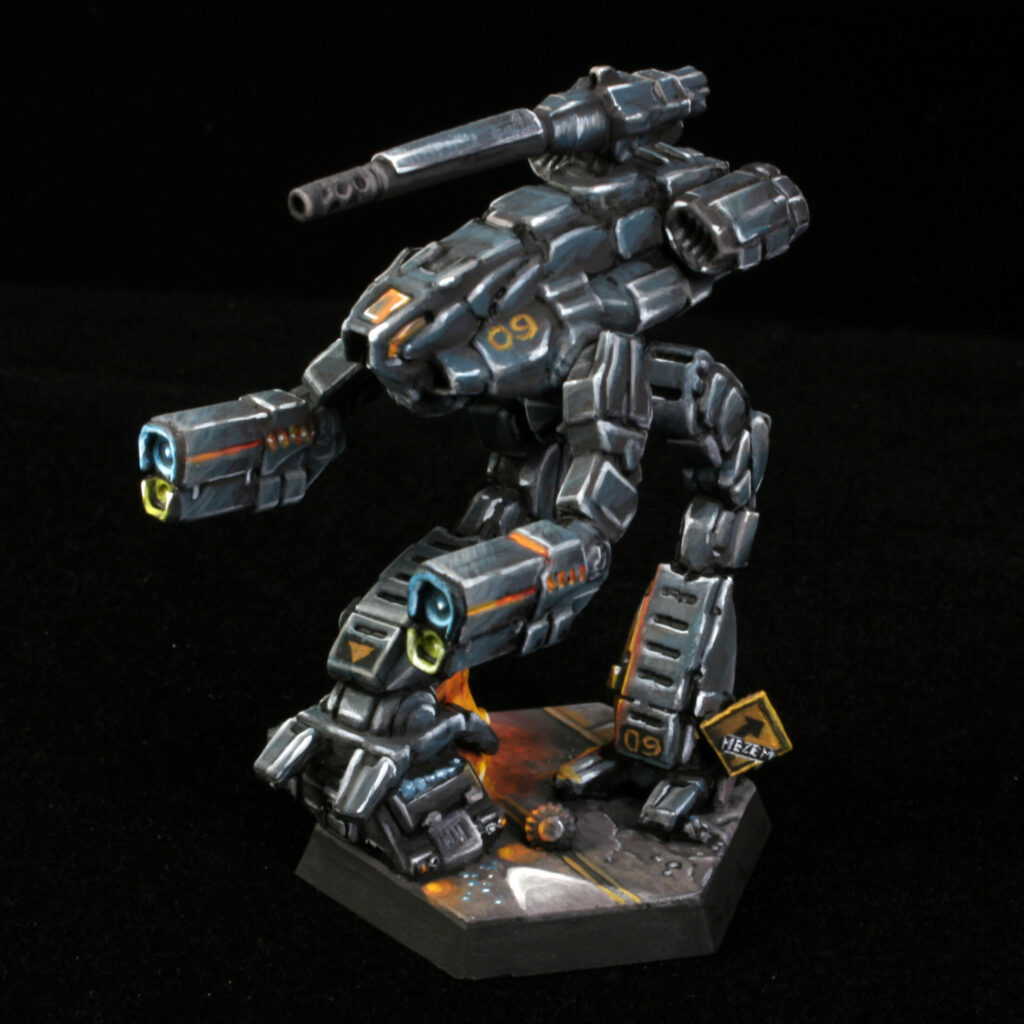 a Marauder miniature painted black with kitbashed terrain