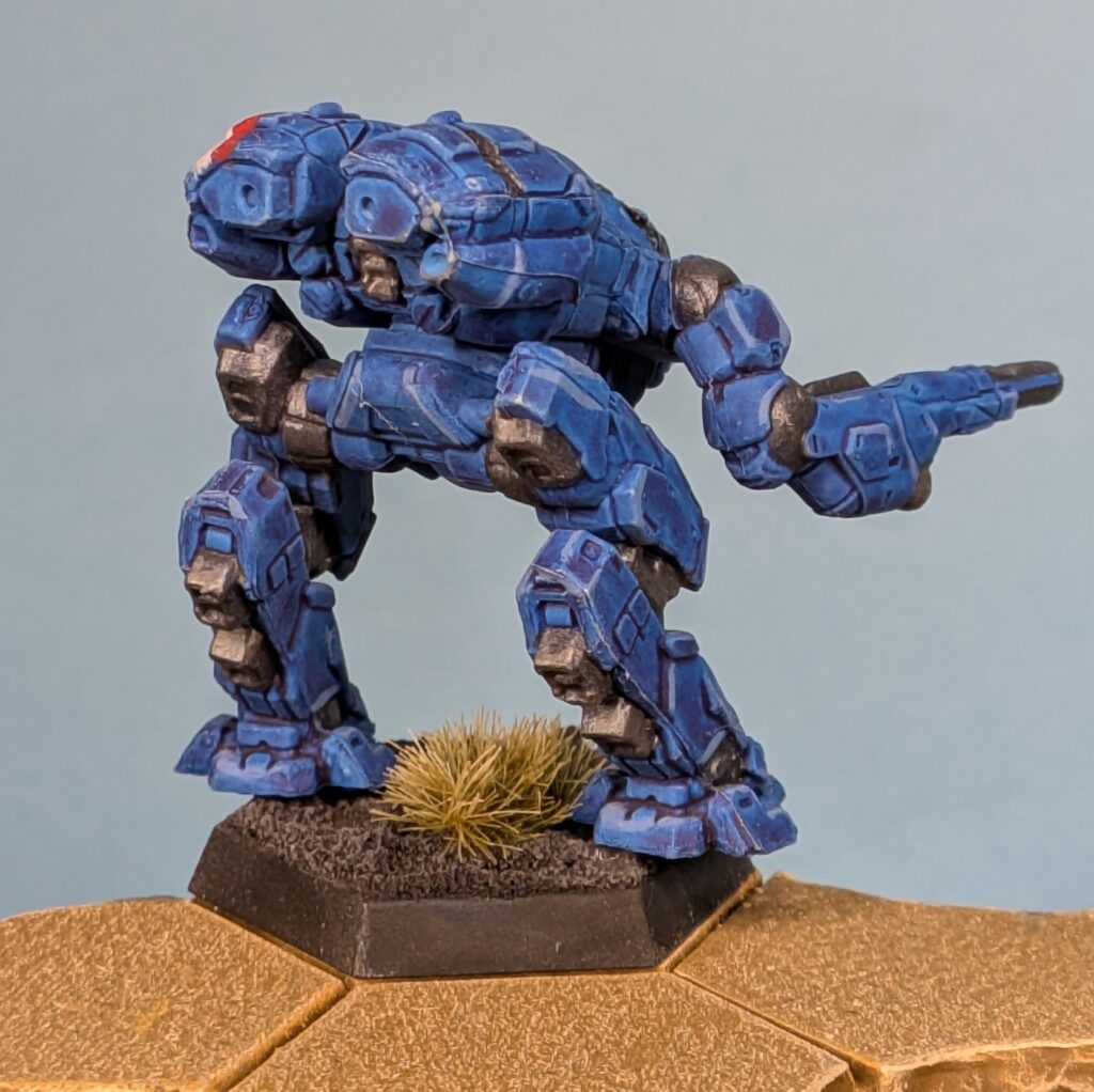 Falconer miniature painted in blue with red & white stripes down the left side