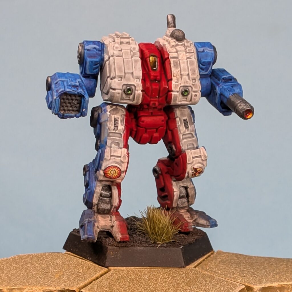 a Thanatos miniature painted in vertical stripes, blue to white to red in the center