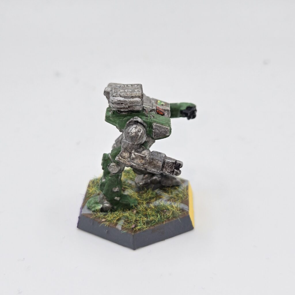 Howler miniature painted metallic grey with green accents