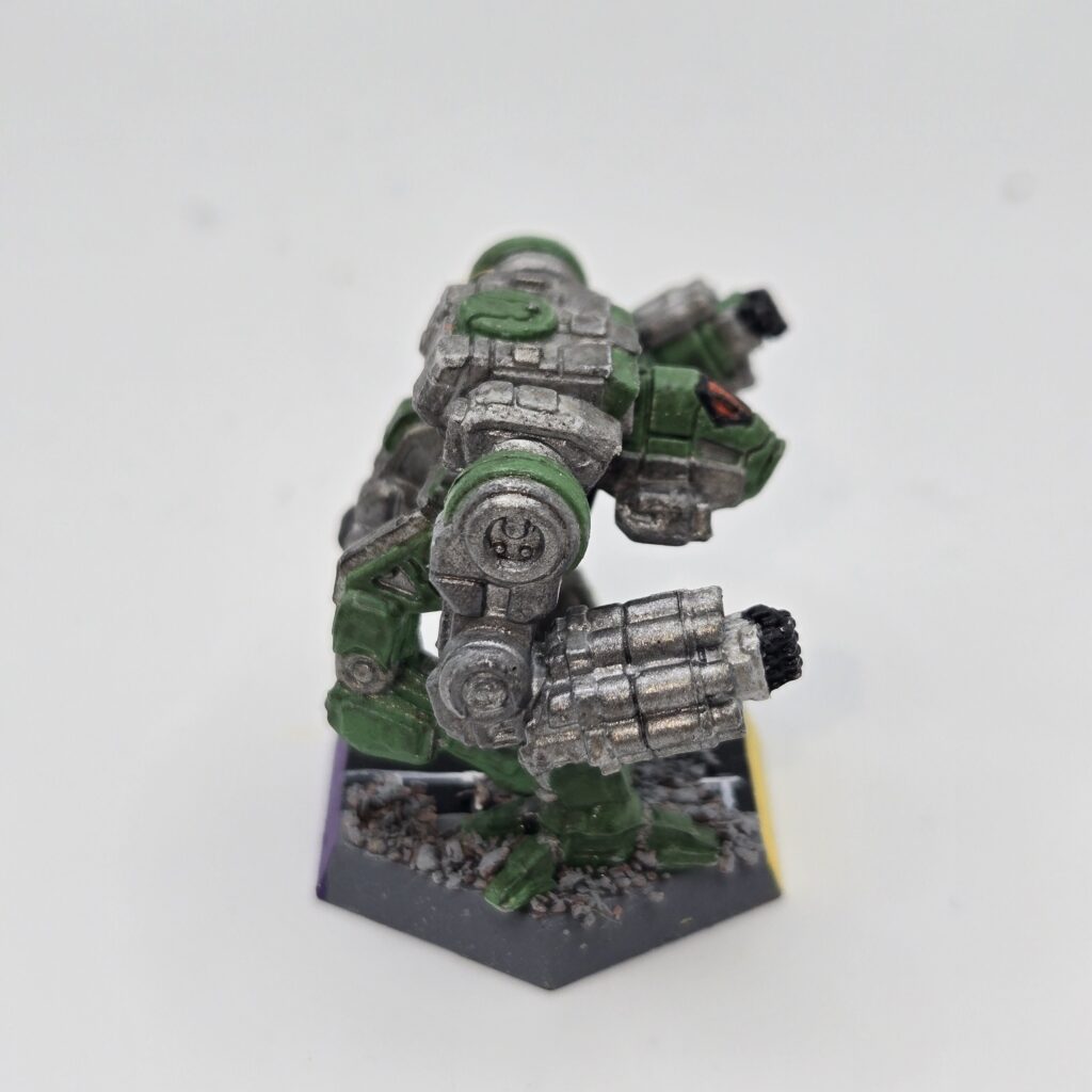 Nova miniature painted metallic grey with green accents