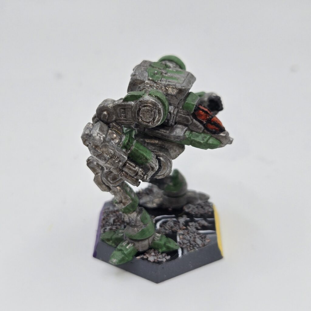 Stormcrow miniature painted metallic grey with green accents