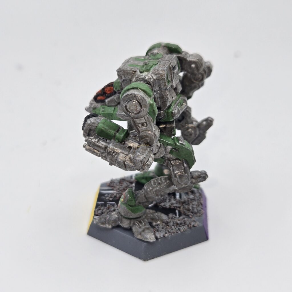 Stormcrow miniature painted metallic grey with green accents