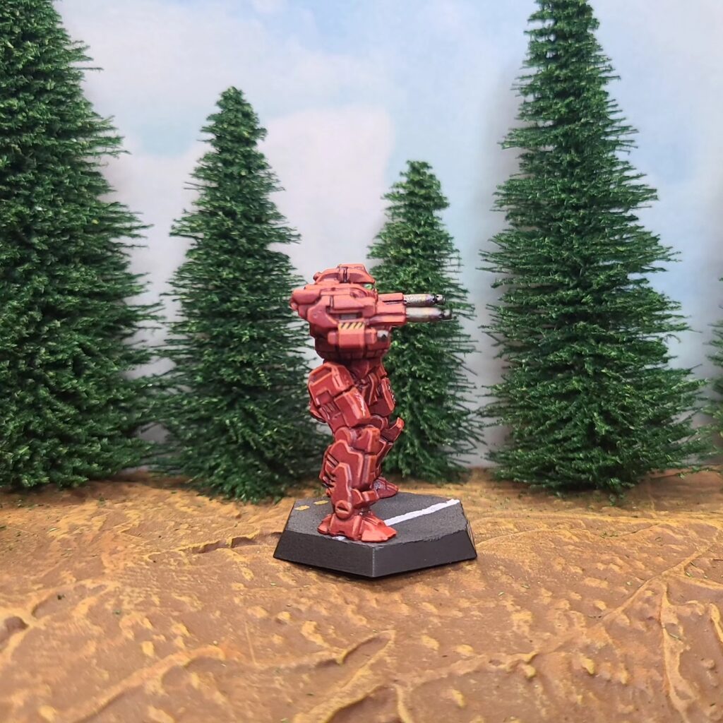 a Blackjack miniature painted red with green cockpit accents