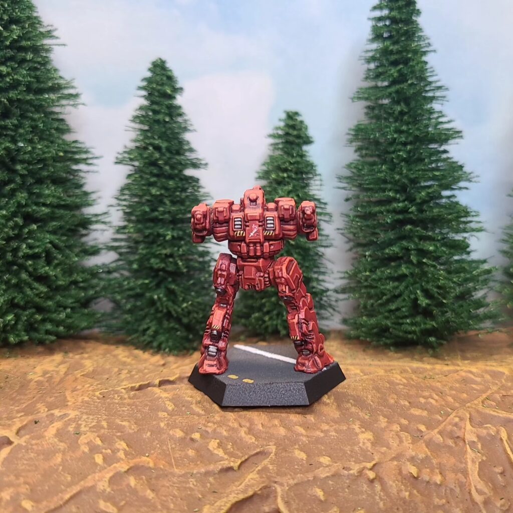 a Blackjack miniature painted red with green cockpit accents