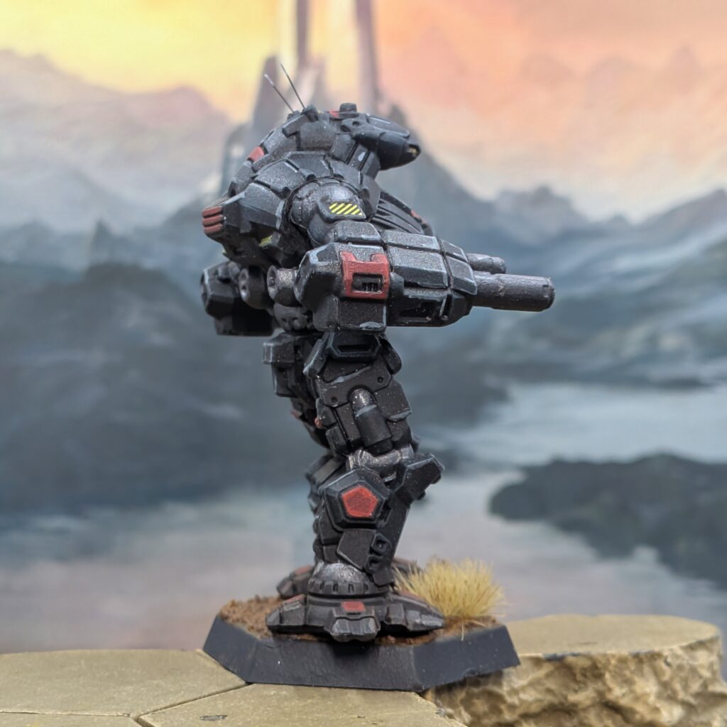 Annihilator miniature painted black with red accents