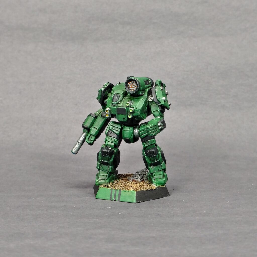 a Thunderbolt miniature painted green with black accents