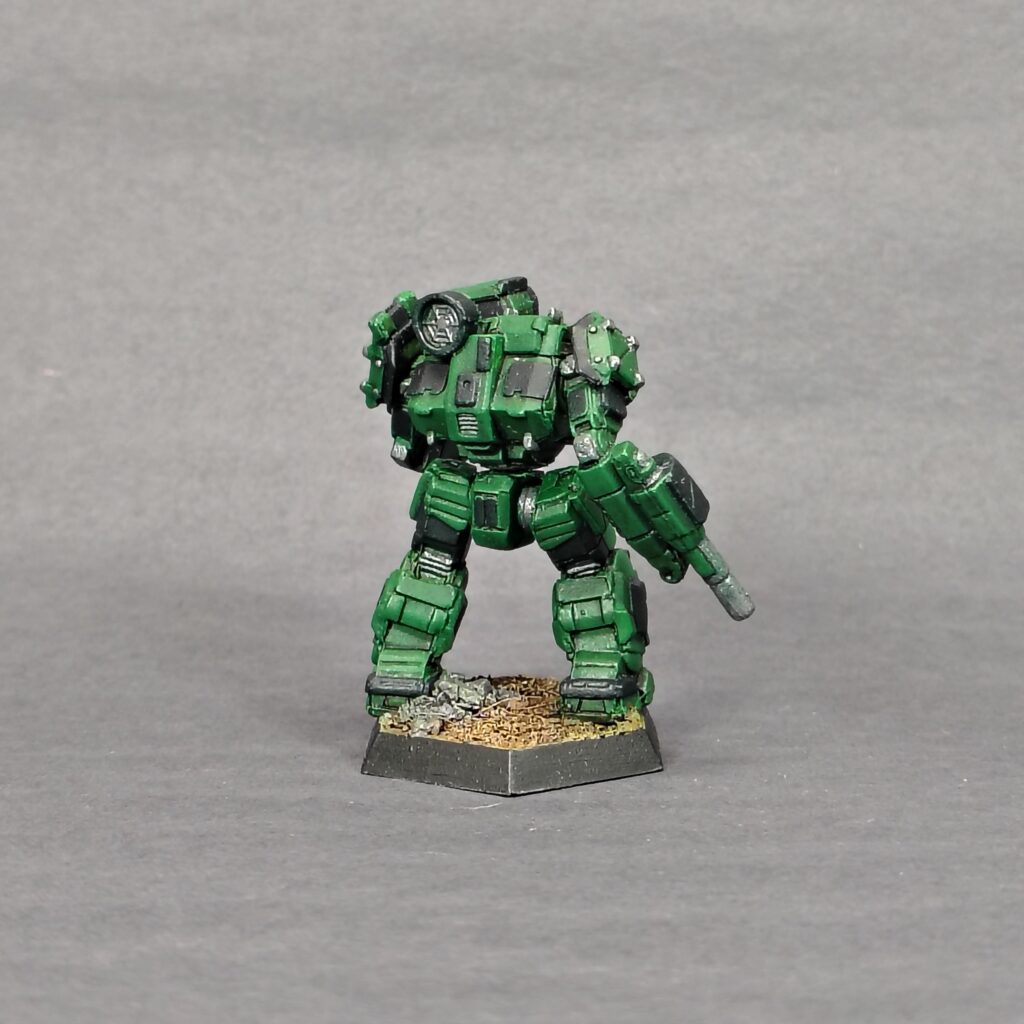 a Thunderbolt miniature painted green with black accents