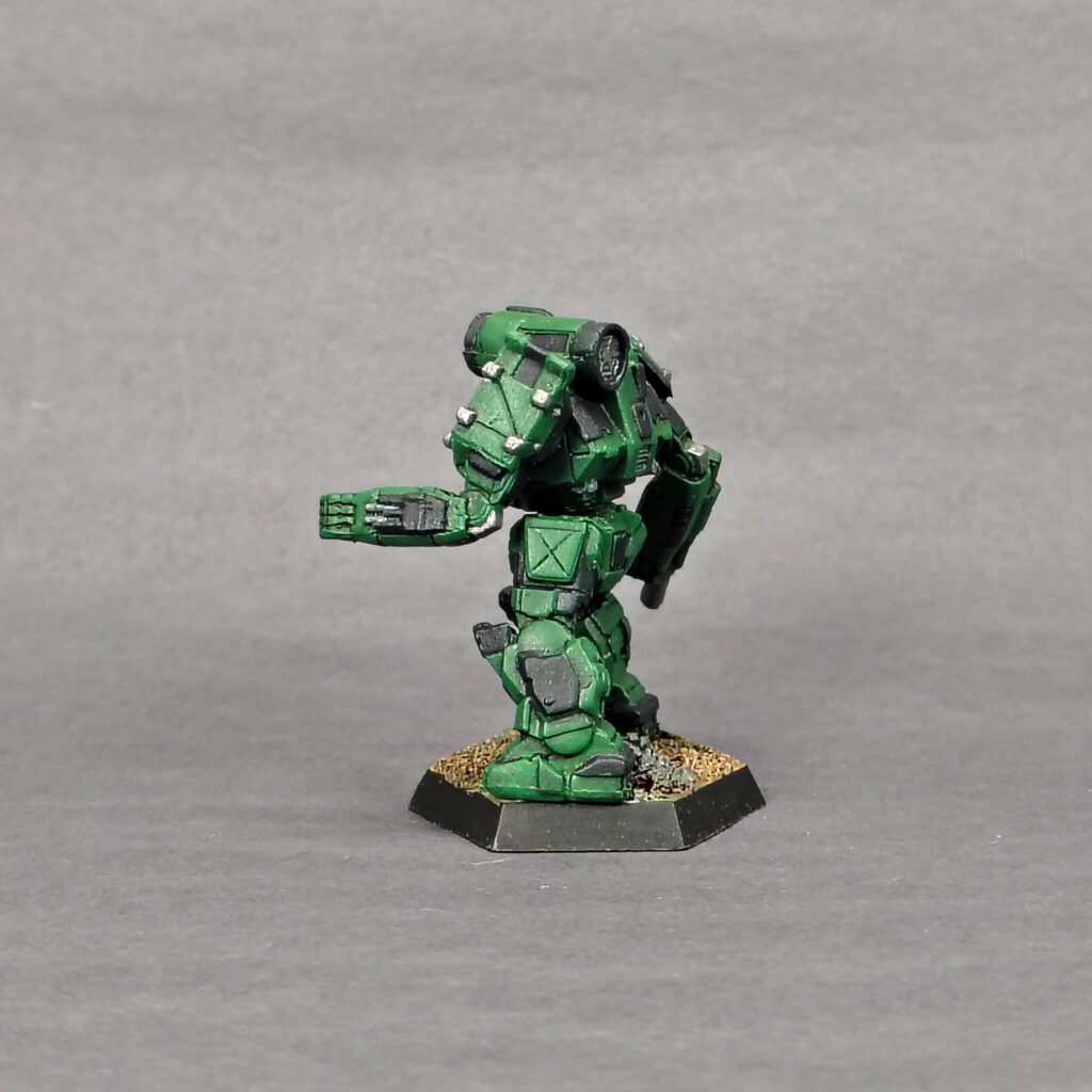 a Thunderbolt miniature painted green with black accents