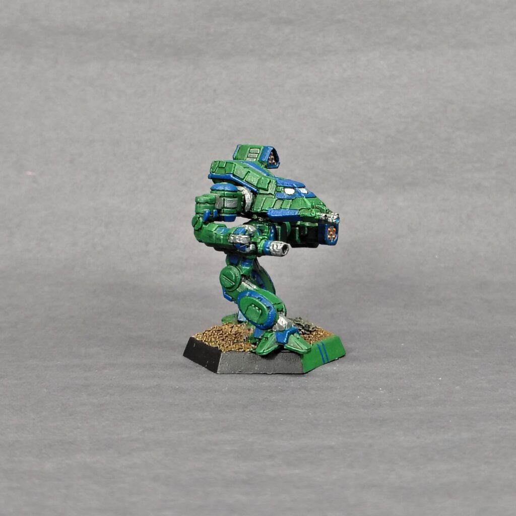 a Bushwacker miniature painted green with blue accents
