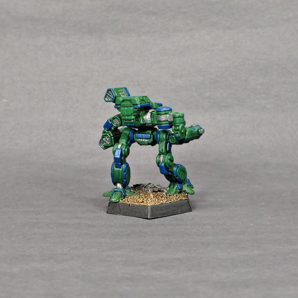 a Bushwacker miniature painted green with blue accents
