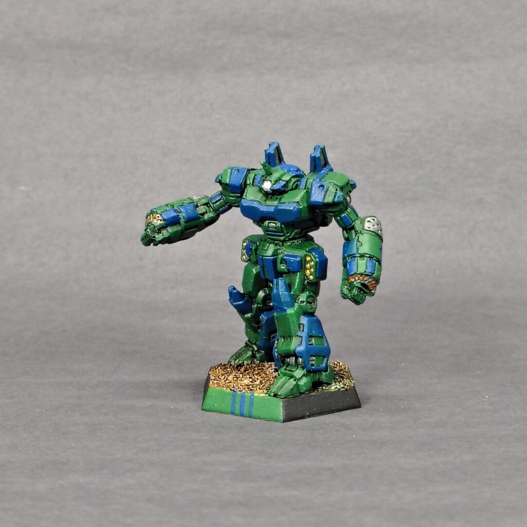 a Crusader miniature painted green with blue accents