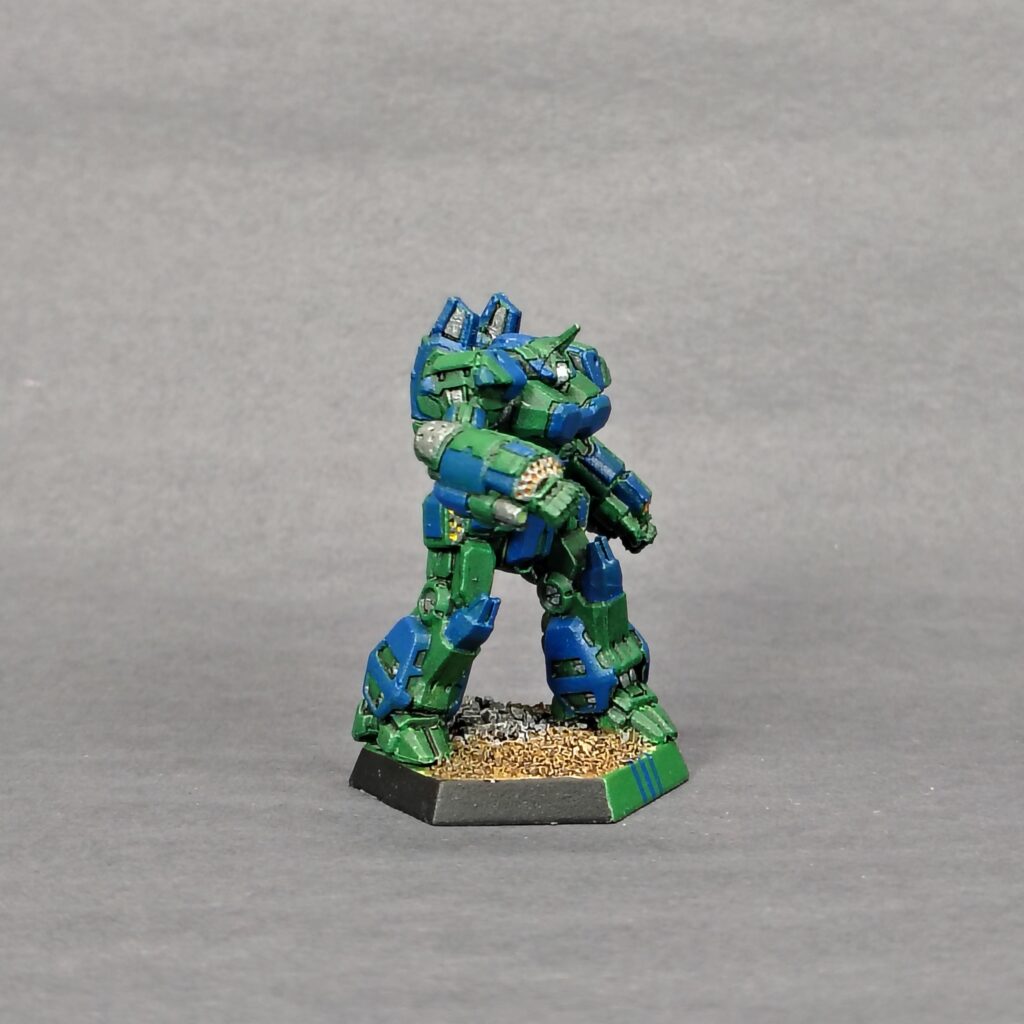 a Crusader miniature painted green with blue accents