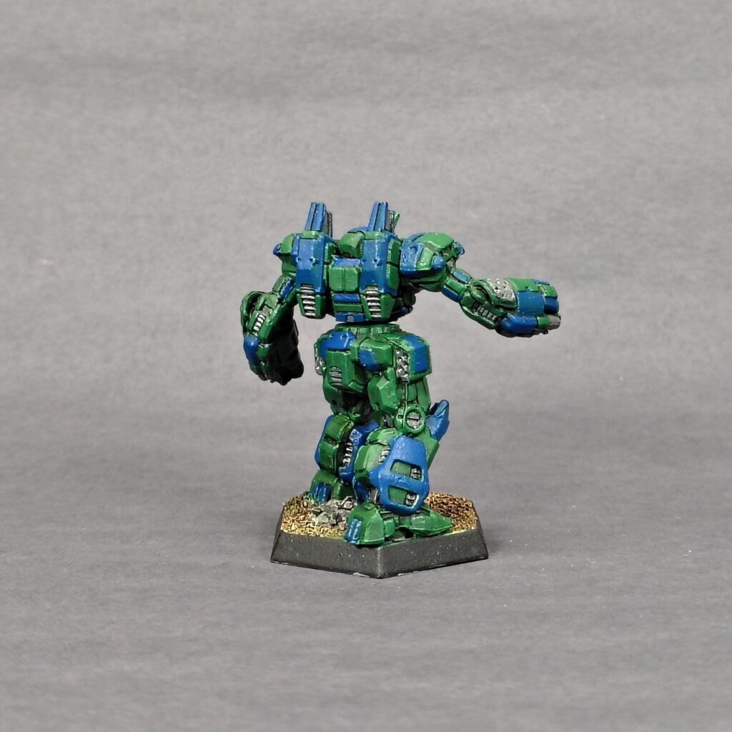 a Crusader miniature painted green with blue accents