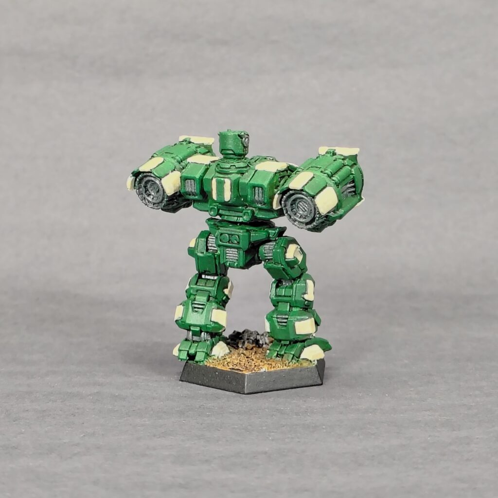 a Longbow miniature painted green with ivory accents