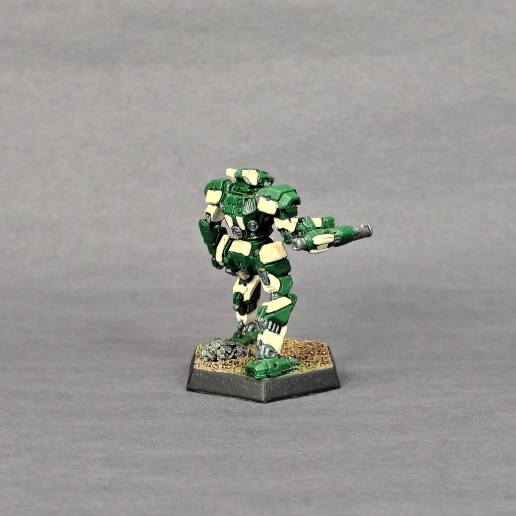 a Panther miniature painted green with ivory accents